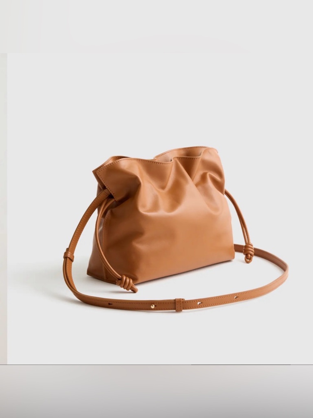 Quince Italian Leather Drawstring Pouch Crossbody Bag in Cognac - Picture 13 of 16